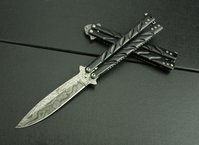 Butterfly - C38 corrugated steel swinging knife