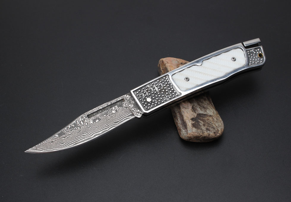 Damascene steel - Solow folding knife