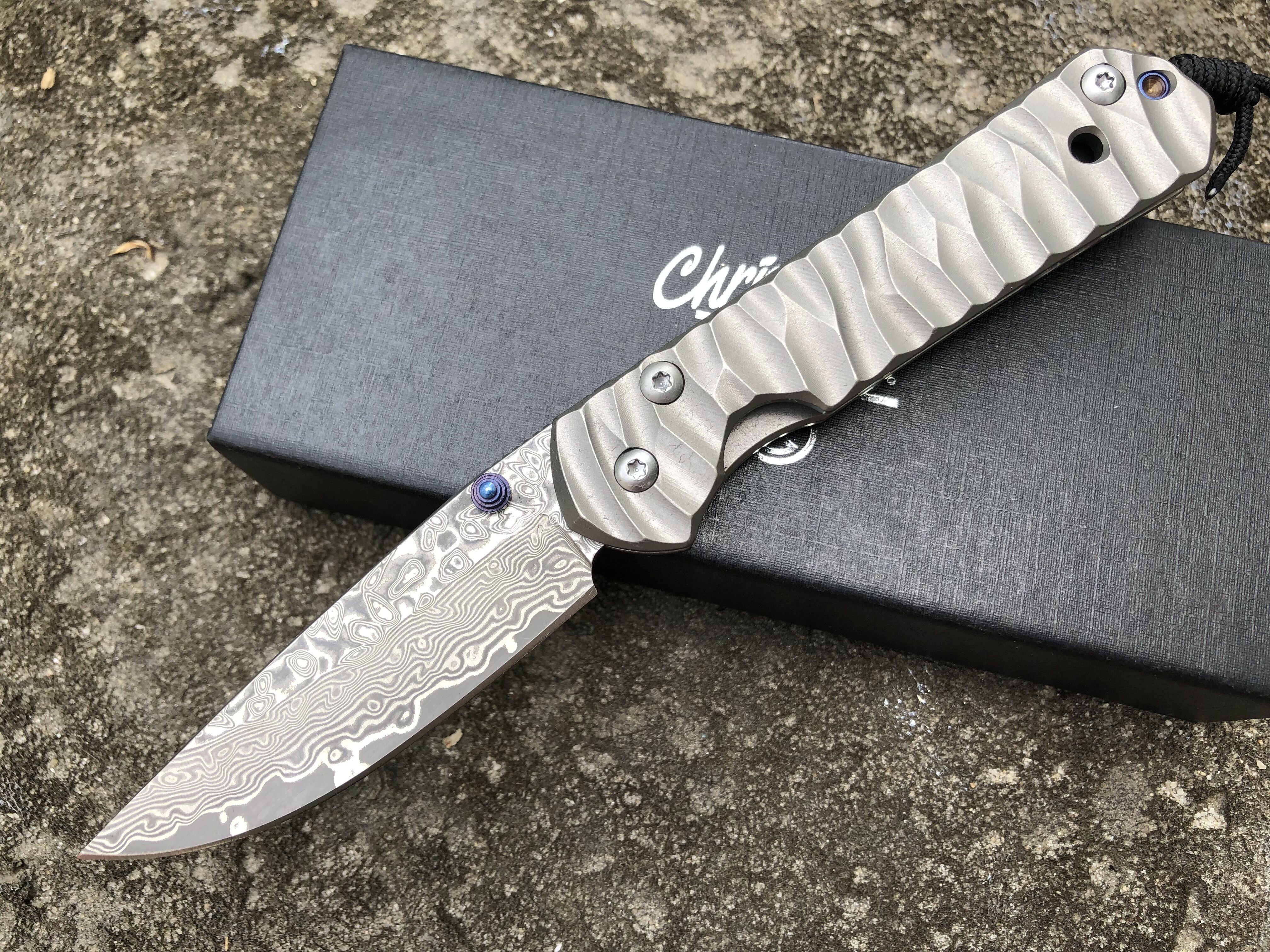 Christopher Damascus Titanium handle folding knife (wavy pattern)