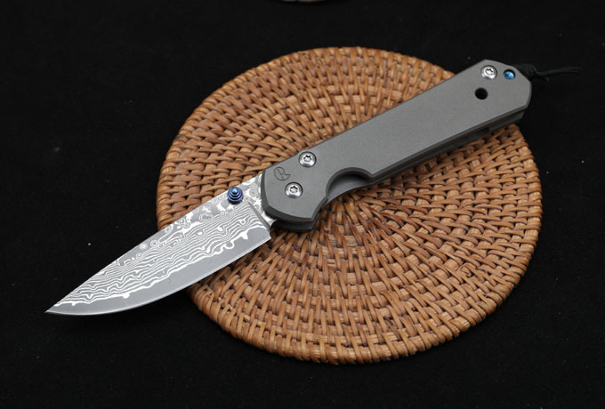 Christopher Damascus Titanium handle folding knife (plane grain)